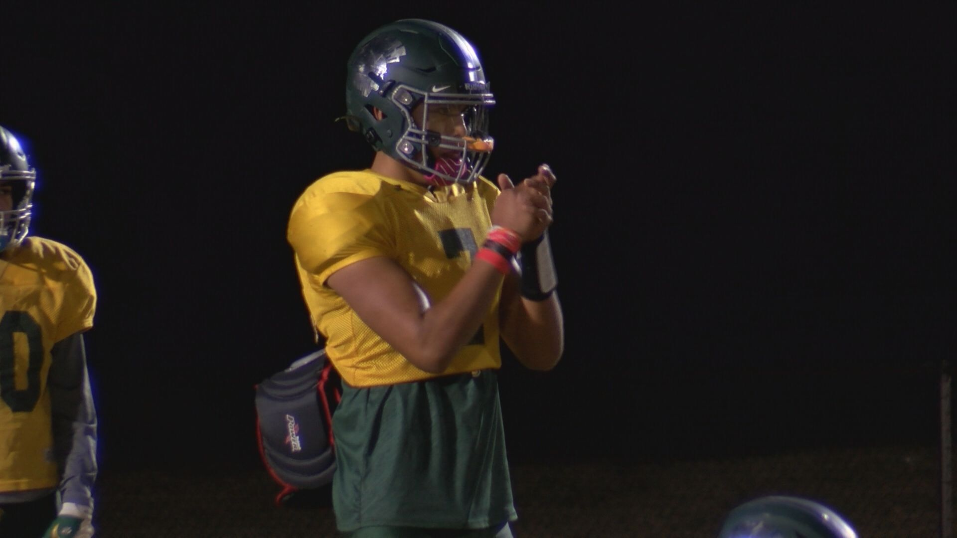 Caden Dawes (21) practice